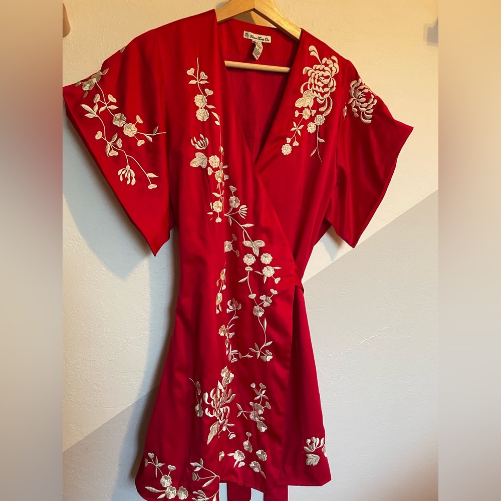 Red kimono-style top with embroidery